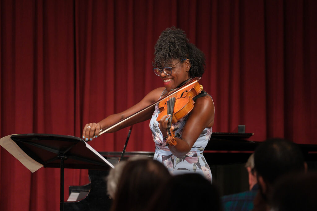 Violinist performing in competition