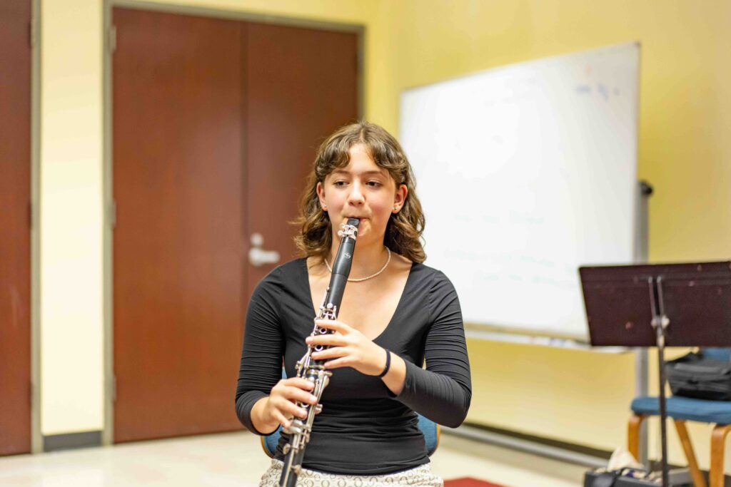 A clarinet student practicing at Levine's NW campus.