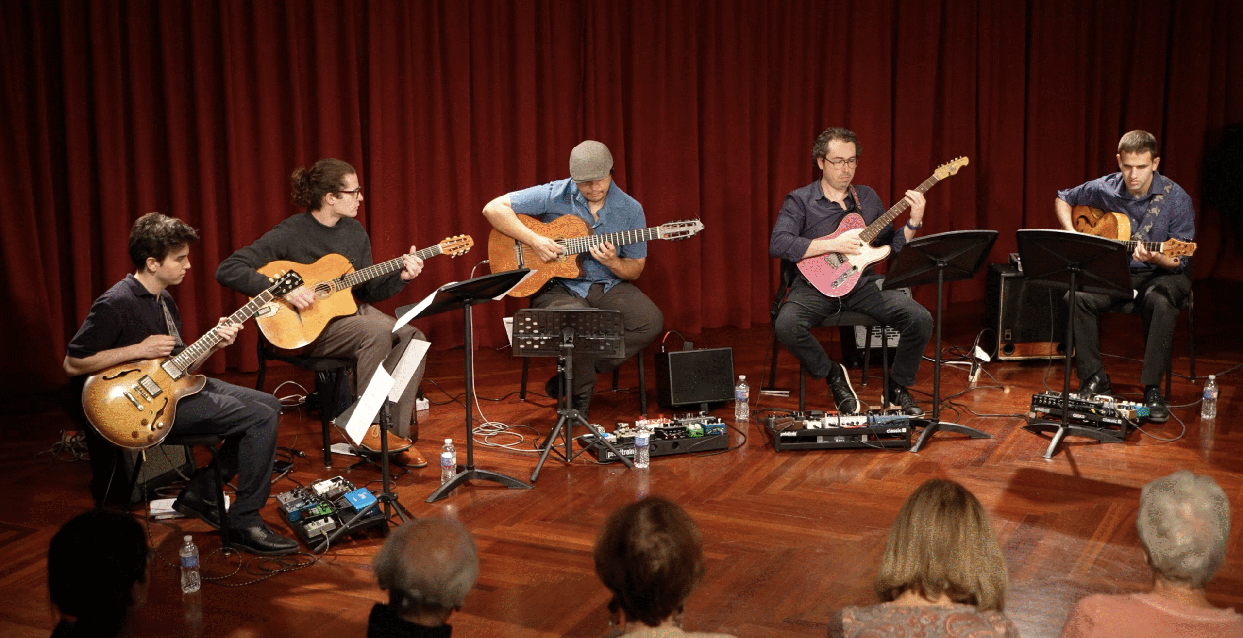 Loeffler alumni series performance of a guitar ensemble.