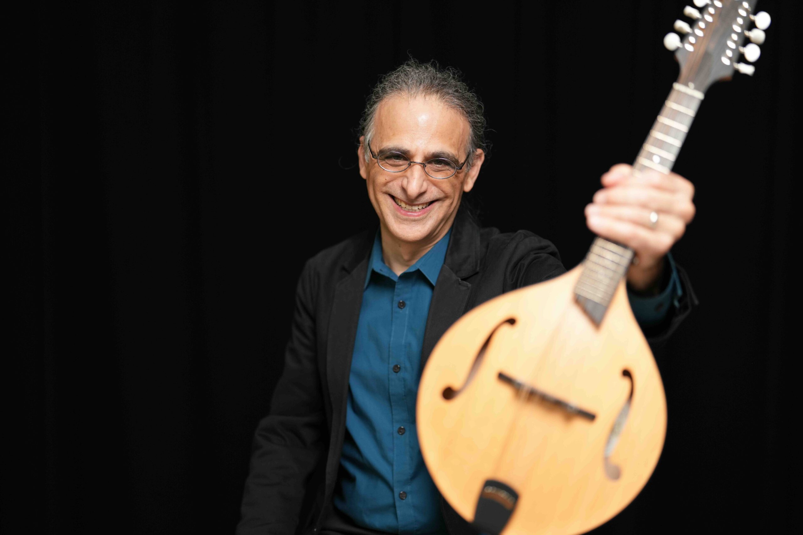 Faculty member Mark Sylvester with his mandolin.