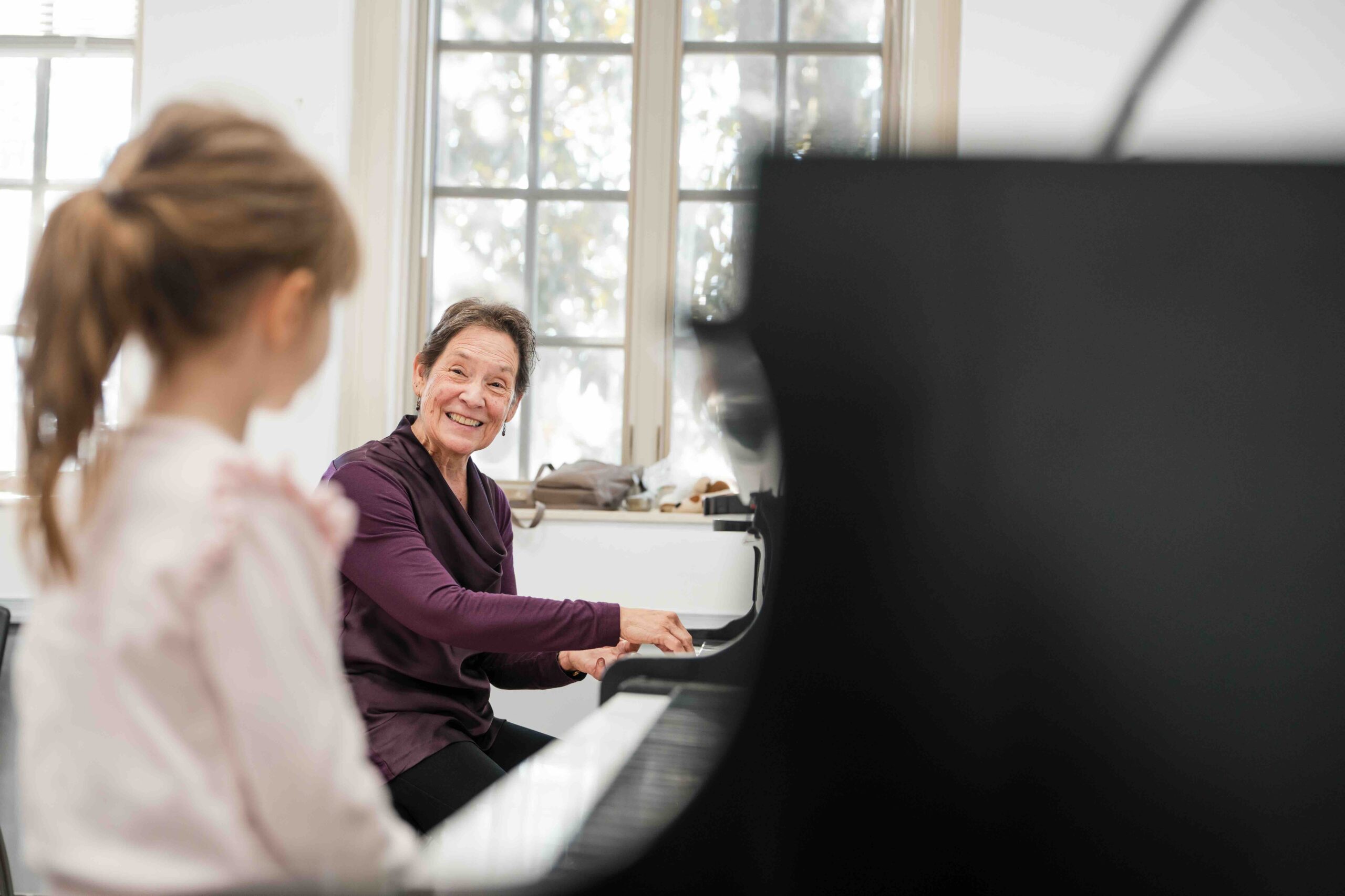 A Levine faculty member leading a Suzuki piano lesson.