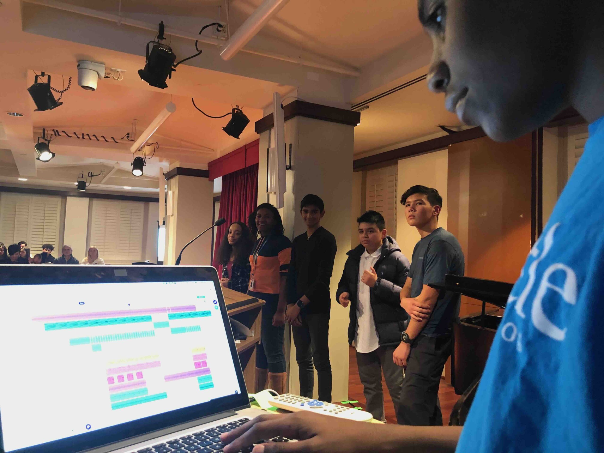 A student presenting a music production project in the Lang.