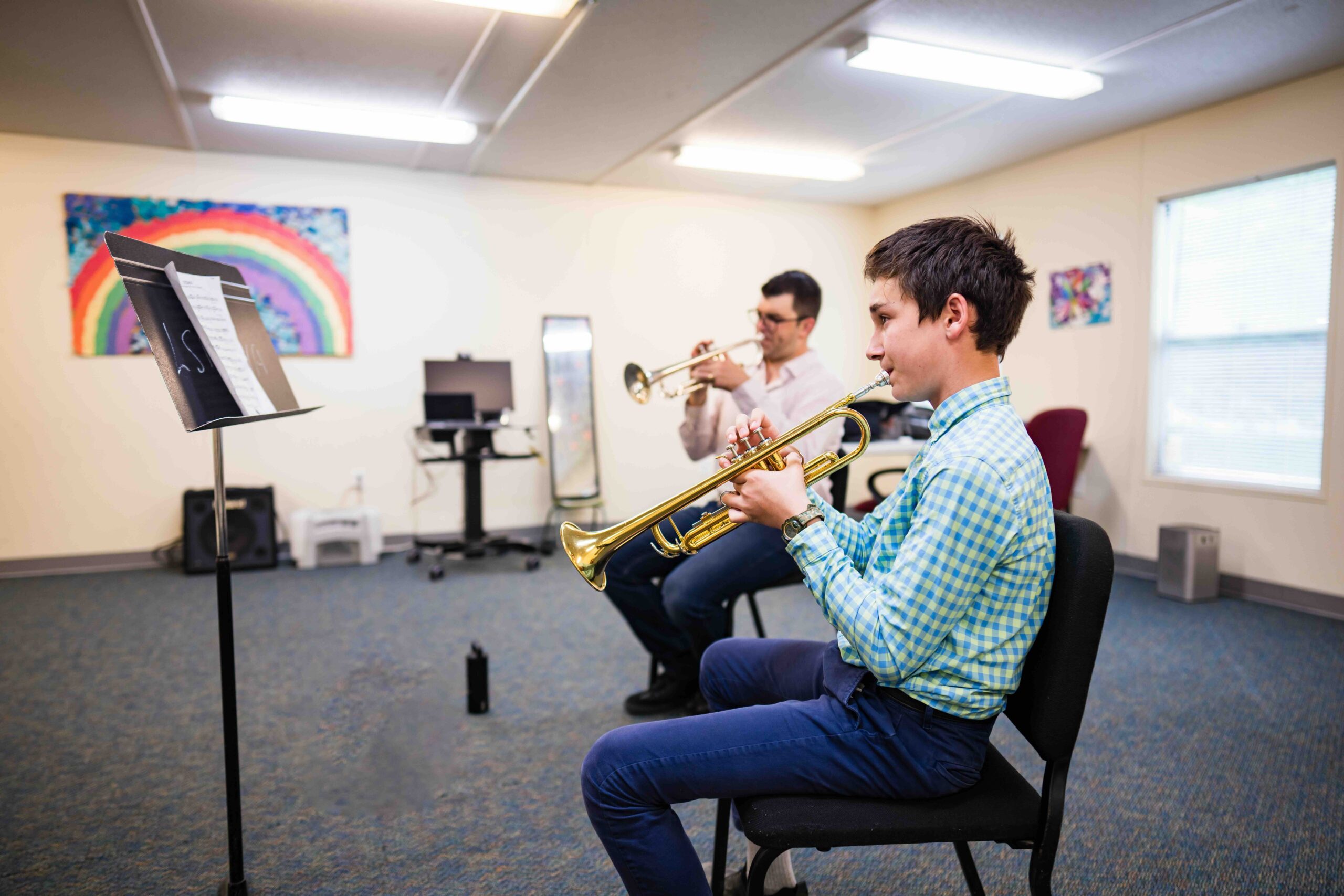 A trumpet student during a lesson.